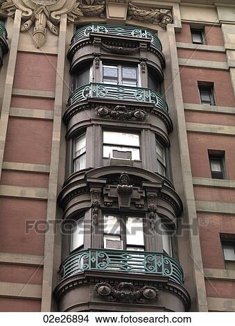 Ornate bay windows in a building in Manhattan, New York City, U. S. A. View Large Photo Image Picture - Ornate bay windows in a building in Manhattan, New York City, U. S. A.. Fotosearch