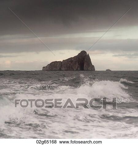 Pacific Ocean with Kicker Rock in the background, San Cristobal Island, Galapagos Islands, Ecuador View Large Photo Image Stock Photo - Pacific Ocean with Kicker Rock in the background, San Cristobal Island, Galapagos Islands, Ecuador. Fotosearch