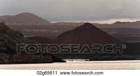 Pacific Ocean with mountain range in the background, Santiago Island, Galapagos Islands, Ecuador View Large Photo Image Stock Image - Pacific Ocean with mountain range in the background, Santiago Island, Galapagos Islands, Ecuador. Fotosearch
