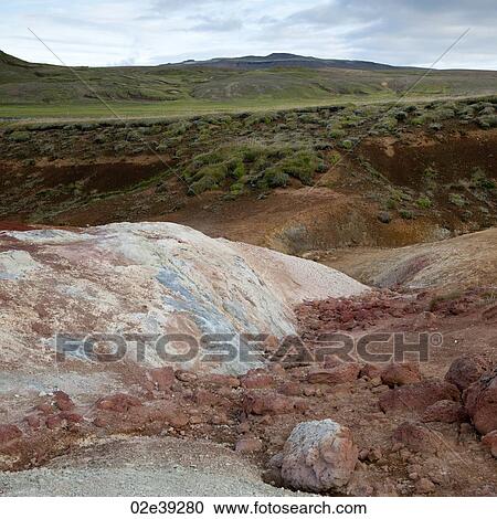 Pastel mineral deposits and grassy landscape View Large Photo Image Stock Image - Pastel mineral deposits and grassy landscape. Fotosearch