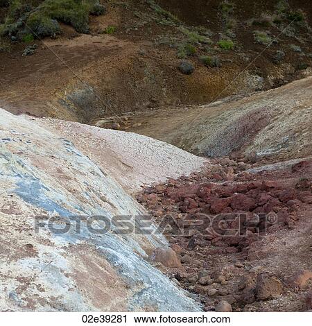 Pastel mineral deposits and grassy landscape View Large Photo Image Stock Image - Pastel mineral deposits and grassy landscape. Fotosearch