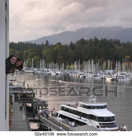 People looking at the boarts in the marina in Vancouver, British Columbia, Canada View Large Photo Image Stock Photograph - People looking at the boarts in the marina in Vancouver, British Columbia, Canada. Fotosearch