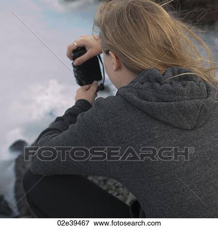 Photographer in sweater View Large Photo Image Stock Photo - Photographer in sweater. Fotosearch