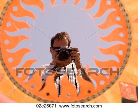 Photographer with camera in Naples View Large Photo Image Stock Image - Photographer with camera in Naples. Fotosearch