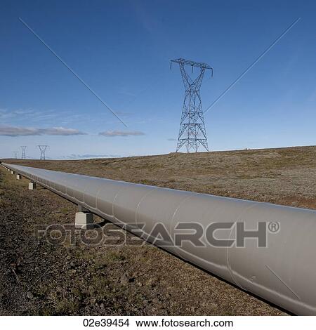 Pipeline through countryside with electrical pylon View Large Photo Image Picture - Pipeline through countryside with electrical pylon. Fotosearch