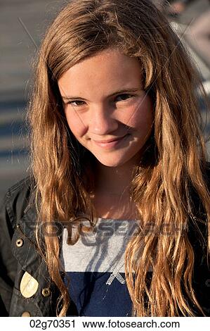 Portrait of a teenage girl smiling, Oslo, Norway View Large Photo Image Stock Image - Portrait of a teenage girl smiling, Oslo, Norway. Fotosearch