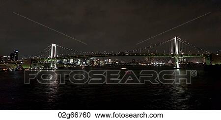Rainbow Bridge across the Tokyo Bay, Minato Ward, Tokyo, Japan View Large Photo Image Stock Image - Rainbow Bridge across the Tokyo Bay, Minato Ward, Tokyo, Japan. Fotosearch