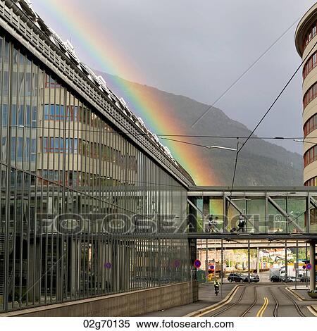 Rainbow over a city, Norway View Large Photo Image Stock Photography - Rainbow over a city, Norway. Fotosearch