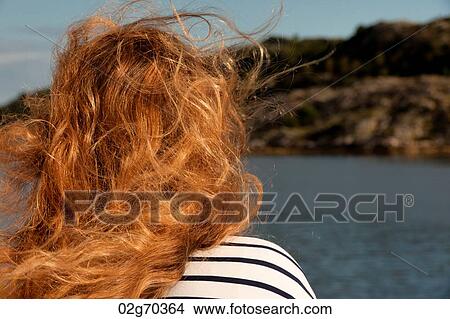 Rear view of a woman looking at a view, Norway View Large Photo Image Picture - Rear view of a woman looking at a view, Norway. Fotosearch