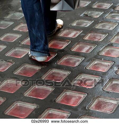 Red glass blocks on a sidewalk in Manhattan, New York City, U. S. A. View Large Photo Image Stock Image - Red glass blocks on a sidewalk in Manhattan, New York City, U. S. A.. Fotosearch