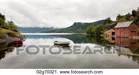 Reflection of a boat in water, Bjorn Fjord, Hardangervidda, Hardanger, Norway View Large Photo Image Stock Image - Reflection of a boat in water, Bjorn Fjord, Hardangervidda, Hardanger, Norway. Fotosearch