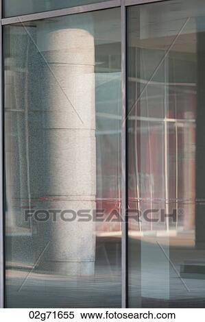 Reflection of a building in a window glass, Binhai, Tianjin, China View Large Photo Image Stock Photography - Reflection of a building in a window glass, Binhai, Tianjin, China. Fotosearch