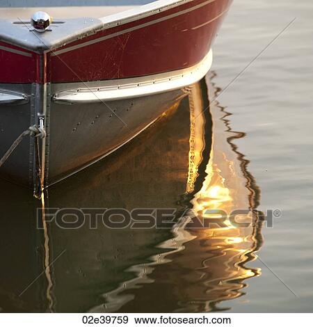 Reflection of boat in the water at Lake of the Woods, Ontario View Large Photo Image Stock Photo - Reflection of boat in the water at Lake of the Woods, Ontario. Fotosearch