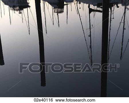 Reflection of boats in Vancouver, British Columbia, Canada View Large Photo Image Stock Photograph - Reflection of boats in Vancouver, British Columbia, Canada. Fotosearch
