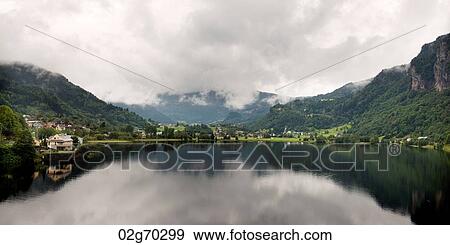 Reflection of clouds in Hardangerfjord, Hardanger, Hardangervidda, Hardanger, Norway View Large Photo Image Stock Photo - Reflection of clouds in Hardangerfjord, Hardanger, Hardangervidda, Hardanger, Norway. Fotosearch
