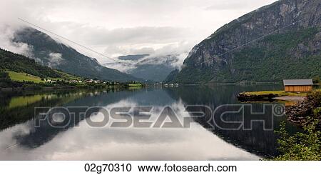 Reflection of mountains on water, Granvinsvatnet, Granvin, Hordaland County, Norway View Large Photo Image Stock Image - Reflection of mountains on water, Granvinsvatnet, Granvin, Hordaland County, Norway. Fotosearch