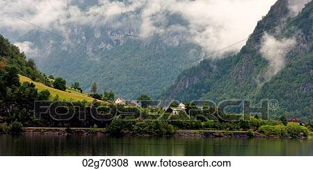 Stock Photo - Reflection of mountains on water, Granvinsvatnet, Granvin, Hordaland County, Norway. Fotosearch