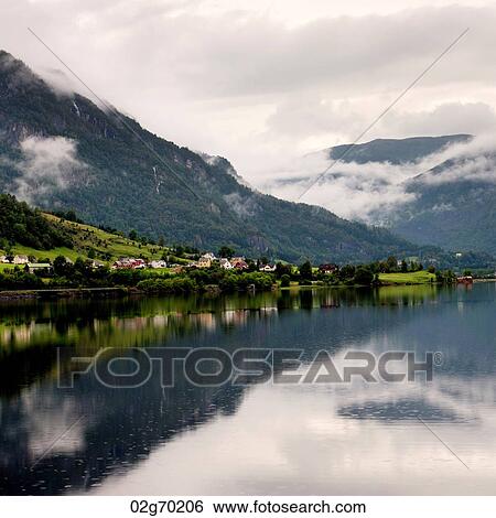 Reflection of mountains on water, Granvinsvatnet, Granvin, Hordaland County, Norway View Large Photo Image Stock Photograph - Reflection of mountains on water, Granvinsvatnet, Granvin, Hordaland County, Norway. Fotosearch