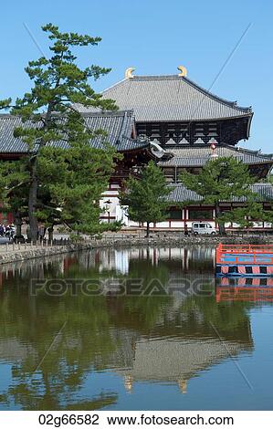 Stock Image - Reflection of Todaiji Temple in water, Nara, Japan. Fotosearch