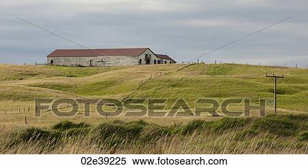 Remote farmland with telephone posed and wire fence View Large Photo Image Stock Photography - Remote farmland with telephone posed and wire fence. Fotosearch