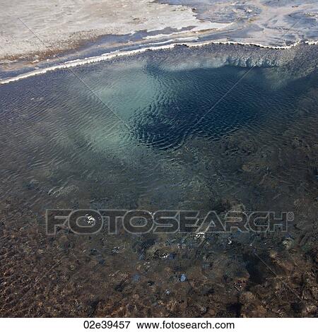 Rippled pool of shallow water with mineral deposits on the shore View Large Photo Image Stock Photo - Rippled pool of shallow water with mineral deposits on the shore. Fotosearch