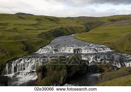 River eroded into hilly pastureland, with whitewater steps View Large Photo Image Stock Photograph - River eroded into hilly pastureland, with whitewater steps. Fotosearch