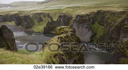 River gorge valley cut through grasslands with steep eroded cliffs View Large Photo Image Stock Photograph - River gorge valley cut through grasslands with steep eroded cliffs. Fotosearch