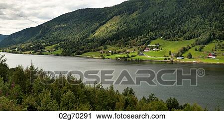 River with village in the background, Norway View Large Photo Image Stock Image - River with village in the background, Norway. Fotosearch