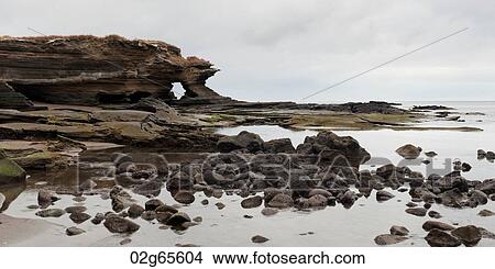 Rock formation on the coast, Puerto Egas, Santiago Island, Galapagos Islands, Ecuador View Large Photo Image Picture - Rock formation on the coast, Puerto Egas, Santiago Island, Galapagos Islands, Ecuador. Fotosearch