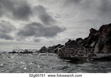Rock formations on the coast, Playa Ochoa, San Cristobal Island, Galapagos Islands, Ecuador View Large Photo Image Stock Image - Rock formations on the coast, Playa Ochoa, San Cristobal Island, Galapagos Islands, Ecuador. Fotosearch