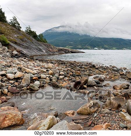 Rocks at the riverside, Hardangervidda, Hardanger, Norway View Large Photo Image Stock Image - Rocks at the riverside, Hardangervidda, Hardanger, Norway. Fotosearch