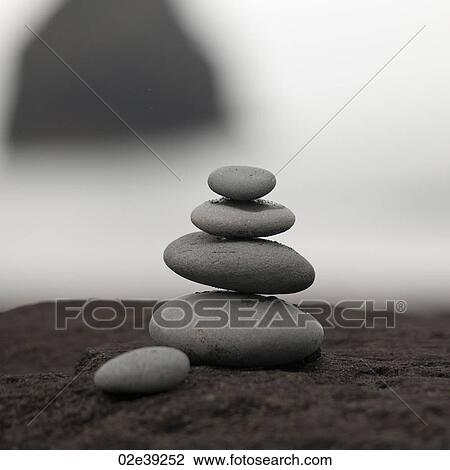 Rocks stacked atop each other View Large Photo Image Stock Image - Rocks stacked atop each other. Fotosearch