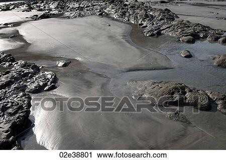 Rocky outcrops on the beach Costa Rica View Large Photo Image Stock Image - Rocky outcrops on the beach Costa Rica. Fotosearch