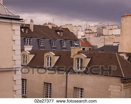 Stock Photo - Roof Tops of buildings in Paris France. Fotosearch