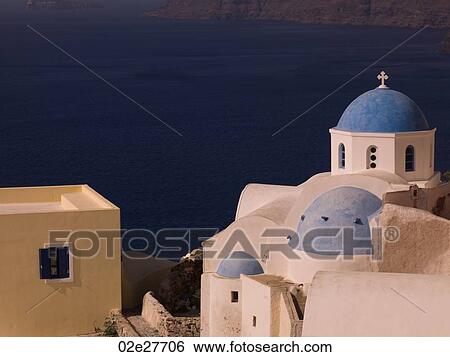 Rooftops of buildings in Santorini Greece View Large Photo Image Stock Photograph - Rooftops of buildings in Santorini Greece. Fotosearch