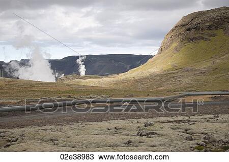 Rugged hills and mountains with steam rising, and a gas pipline along the road View Large Photo Image Stock Image - Rugged hills and mountains with steam rising, and a gas pipline along the road. Fotosearch