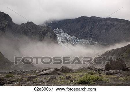 Rugged mountain landscape with river and mist rising View Large Photo Image Stock Photo - Rugged mountain landscape with river and mist rising. Fotosearch