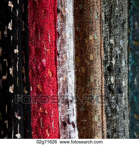 Scarves hanging at a market stall, Huay Pu Keng, Mae Hong Son Province, Thailand View Large Photo Image Stock Photograph - Scarves hanging at a market stall, Huay Pu Keng, Mae Hong Son Province, Thailand. Fotosearch