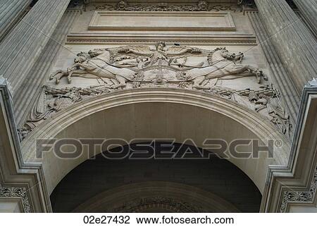 Stock Image - Sculpted arch in Paris France. Fotosearch