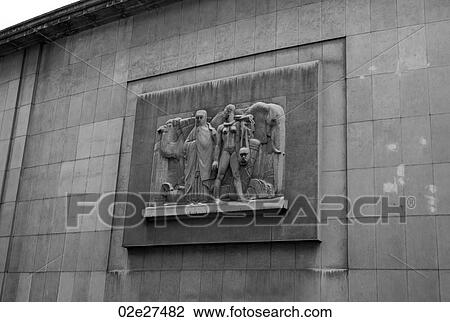 Sculpted mural in Paris France View Large Photo Image Stock Image - Sculpted mural in Paris France. Fotosearch