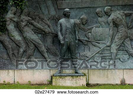 Stock Photo - Sculpture and mural in Paris France. Fotosearch