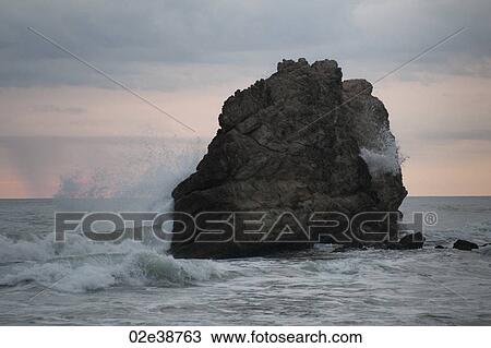 Stock Image - Seascape along Mal Pais coastline in San Jose Costa Rica. Fotosearch