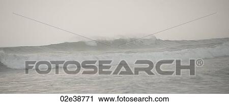 Stock Image - Seascape along Mal Pais coastline in San Jose Costa Rica. Fotosearch