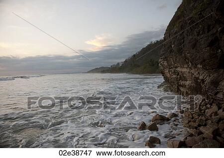 Stock Photo - Seascape along Mal Pais coastline in San Jose Costa Rica. Fotosearch