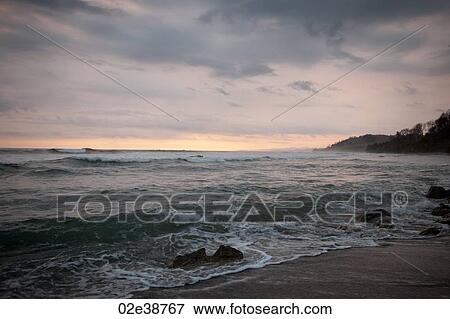 Seascape along Mal Pais coastline in San Jose Costa Rica View Large Photo Image Stock Photo - Seascape along Mal Pais coastline in San Jose Costa Rica. Fotosearch