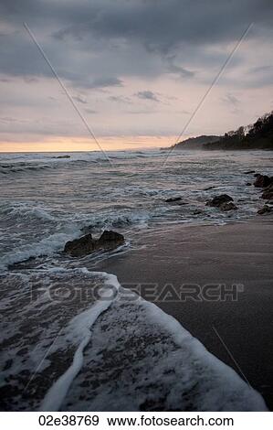 Seascape along Mal Pais coastline in San Jose Costa Rica View Large Photo Image Stock Photo - Seascape along Mal Pais coastline in San Jose Costa Rica. Fotosearch