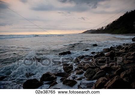 Stock Photography - Seascape along Mal Pais coastline in San Jose Costa Rica. Fotosearch
