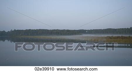 Shoreline at twilight in Lake of the Woods, Ontario View Large Photo Image Stock Image - Shoreline at twilight in Lake of the Woods, Ontario. Fotosearch