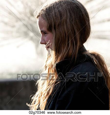 Stock Photograph - Side profile of a teenage girl, National Theatre, Oslo, Norway. Fotosearch