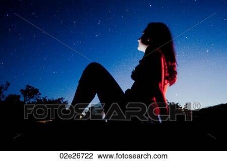 Silhouette of a girl against Kenya sky at sunset View Large Photo Image Stock Image - Silhouette of a girl against Kenya sky at sunset. Fotosearch